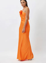 Load image into Gallery viewer, Tina Halter Dress - Orange Featuring A Flower On The Neckline
